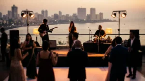 A live band performing at a corporate rooftop party in Mumbai at dusk